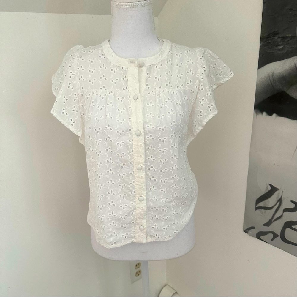 1. State eyelet top